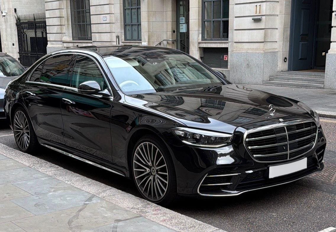Black Mercedes-Benz S-Class chauffeur vehicle